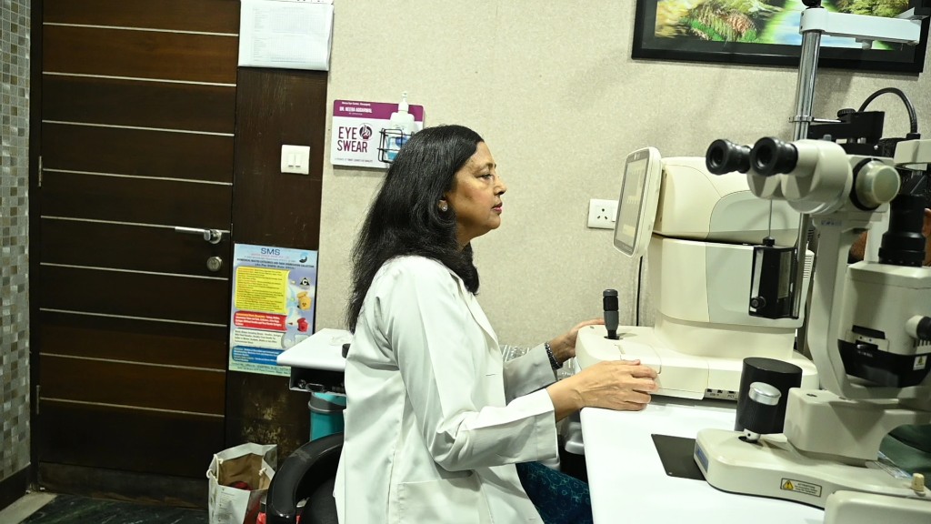 Doctor using advanced diagnostic equipment at Neera Eye Centre